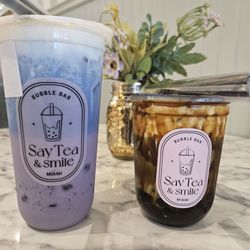 Say Tea & Smile - Coral Gables - Butterfly pea tea latte and matcha black sugar tea