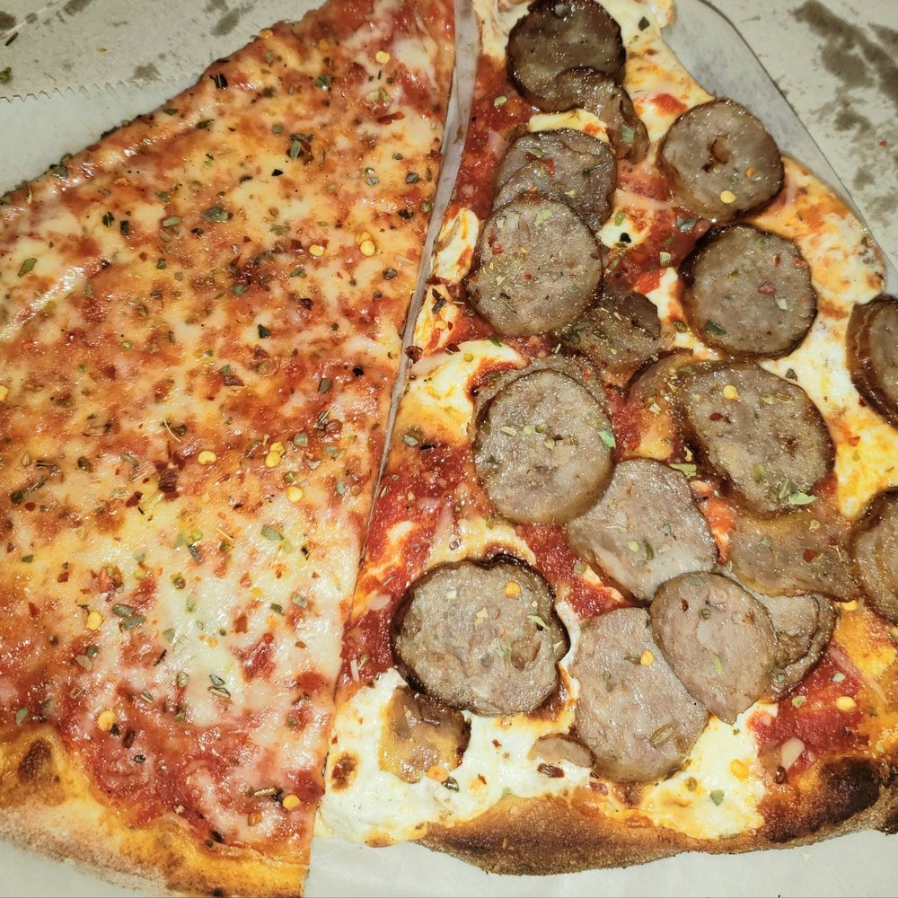 two slices of sausage pizza two slices of sausage pizza