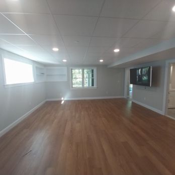 DRM Solutions - an empty room with wood floors - General Contractors Near Me - Methuen, Massachusetts
