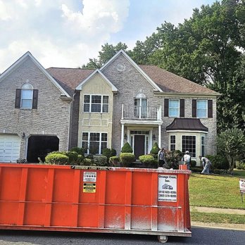 Orange Cans - Orange Can Dumpster at residential roofing project in Bear DE - Dumpster Rental Near Me - Chesapeake City, Maryland Orange Cans - Orange Can Dumpster at residential roofing project in Bear DE - Dumpster Rental Near Me - Chesapeake City, Maryland