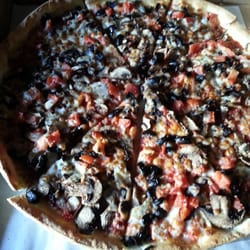Pizza Hut - Large thin and crispy crust with mushrooms, olives and diced tomatoes.