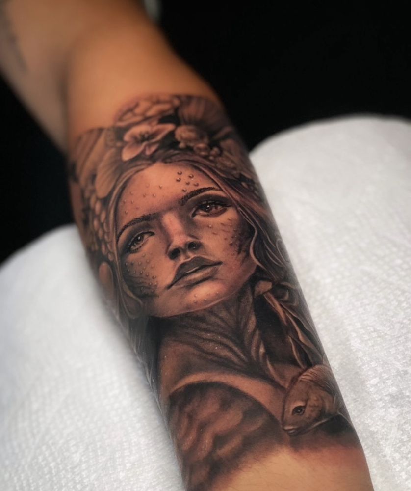 Red Hand Tattoo Logo