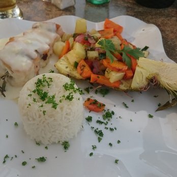 Restaurant Bricklebrit - Zander, Lachs auf Rosmarinzweig, Champagner Soße und Möhren Ananas Gemüse auf Basmati Reis - German Near Me - Loddin, MV Restaurant Bricklebrit - Zander, Lachs auf Rosmarinzweig, Champagner Soße und Möhren Ananas Gemüse auf Basmati Reis - German Near Me - Loddin, MV