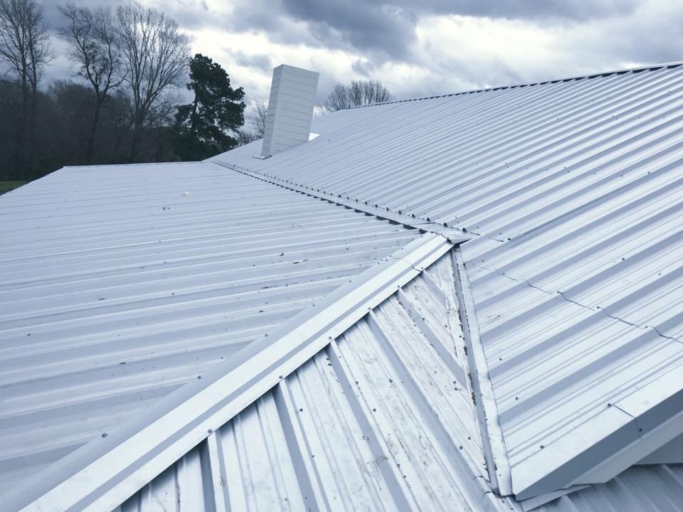 Slide of SNZ Roofing & Construction