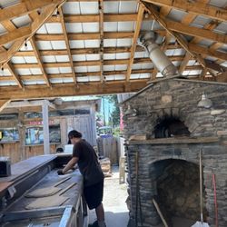 High Tides "The Black Pearl" Tiki Bar - Making pizza!
