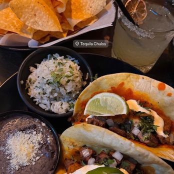Tequila Chulos - Got the Carne Asada Tacos, classic Margarita, Chips and Queso Blanco - Mexican Near Me - Oklahoma City, Oklahoma Tequila Chulos - Got the Carne Asada Tacos, classic Margarita, Chips and Queso Blanco - Mexican Near Me - Oklahoma City, Oklahoma