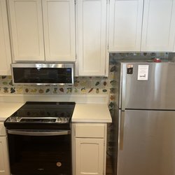 Bozzuto's Furniture and Appliance - Whirlpool Fridge, Stove Top/Slide In Oven, Perfectly Placed Micro Above!