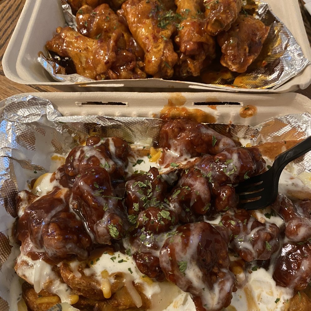 WingMan Redlands - Top: Mango Fuego wings (no fries so they added +2 wings no charge). Bottom: boogie bbq loaded fries (aka drooooool) - Chicken Wings Near Me - Redlands, California WingMan Redlands - Top: Mango Fuego wings (no fries so they added +2 wings no charge). Bottom: boogie bbq loaded fries (aka drooooool) - Chicken Wings Near Me - Redlands, California