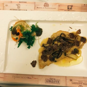 Osteria Barberini - Grithead fish fillet with spring white truffle (and a yummy pita type bread holding the salad) - Seafood Near Me - Rome, RM Osteria Barberini - Grithead fish fillet with spring white truffle (and a yummy pita type bread holding the salad) - Seafood Near Me - Rome, RM