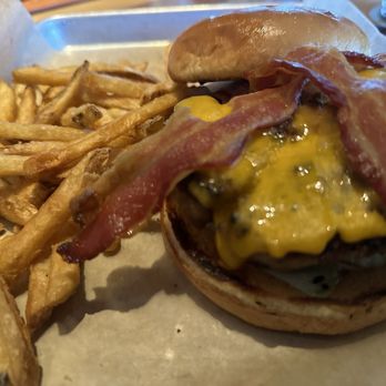 BJ's Restaurant & Brewhouse - Bacon Cheeseburger* - all veggies placed under the meat - New American Near Me - San Antonio, Texas BJ's Restaurant & Brewhouse - Bacon Cheeseburger* - all veggies placed under the meat - New American Near Me - San Antonio, Texas
