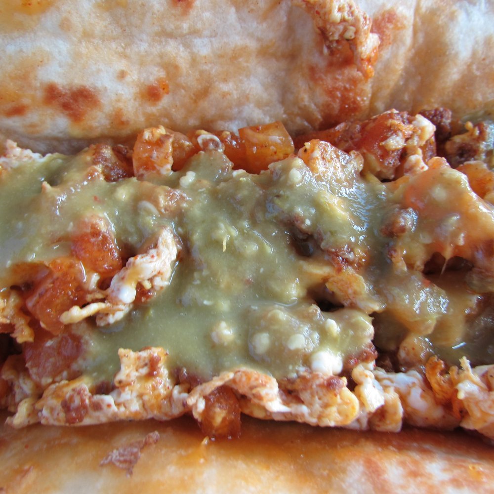 Con Madre Kitchen - Breakfast burrito with chorizo, egg, potato, cheese, and green salsa. - Mexican Near Me - Austin, Texas