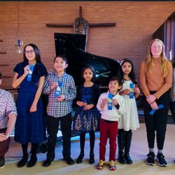 Piano Lessons In Your Home - We offer optional group recitals to give the students an opportunity to perform in front of an audience.