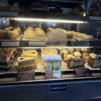 Alpha Omega Grill & Bakery - Dessert window , looked delicious - Coffee & Tea Near Me - Waco, Texas