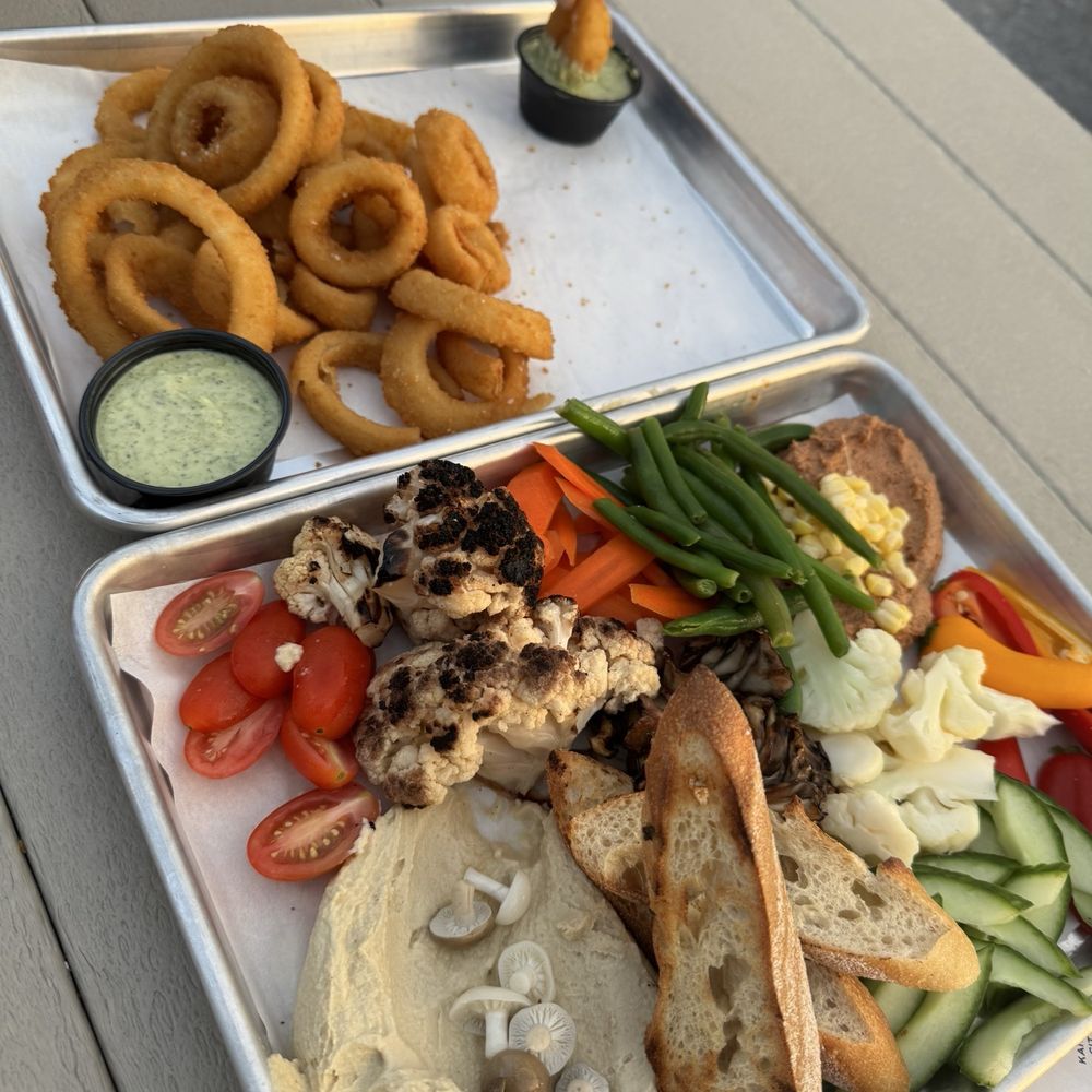 Two Birds One Stone - Mezze Plate & Onion Rings - Beer Gardens Near Me - Kansas City, Missouri Two Birds One Stone - Mezze Plate & Onion Rings - Beer Gardens Near Me - Kansas City, Missouri
