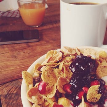Farm : Table - House cereal, house coffee, and house juice in the background. Delicious! - Coffee & Tea Near Me - San Francisco, California