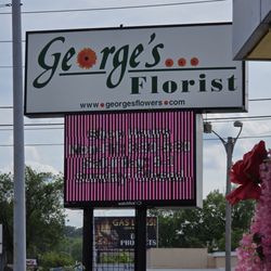George's Flowers - Their sign as seen from the cars as they drive by this local.flower shop.