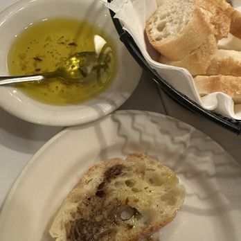 Paolo's Italian Restaurant - Bread w/ olive oil & vinegar - Italian Near Me - Kent, Washington Paolo's Italian Restaurant - Bread w/ olive oil & vinegar - Italian Near Me - Kent, Washington