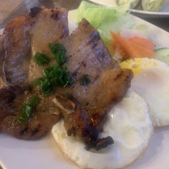 Pho Hoan Pasteur Gardena - Grilled pork chop with egg, served with a side of soup. - Vietnamese Near Me - Gardena, California Pho Hoan Pasteur Gardena - Grilled pork chop with egg, served with a side of soup. - Vietnamese Near Me - Gardena, California