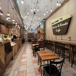 The Build Chicago - Custom sign, light fixture installation and built in black walnut slab wall counters
