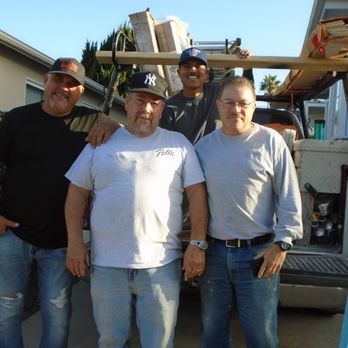 Pella Windows and Doors Showroom of San Diego, CA - From left to right: Miguel, Efrain, Francisco and Santos arrived with plenty of tools, lumber, paint and other supplies. - Windows Installation Near Me - San Diego, California