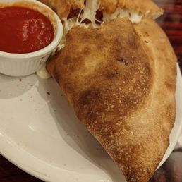 Calzone -pepperoni, spinach, garlic,  $17.99