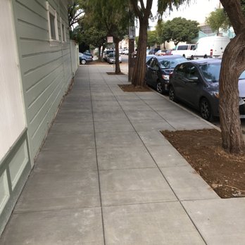 Michael Heavey Construction - New sidewalk the day after clean-up. Completely new pavement along, enlarged boxes for the tree roots, and decomposed granite in the boxes - General Contractors Near Me - San Francisco, California Michael Heavey Construction - New sidewalk the day after clean-up. Completely new pavement along, enlarged boxes for the tree roots, and decomposed granite in the boxes - General Contractors Near Me - San Francisco, California