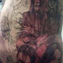 Adventure Tattoos - SLIPKNOT ON RIBS