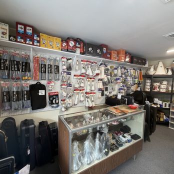 Rhapsody Music - Musical Instruments & Teachers Near Me - Johns, Florida