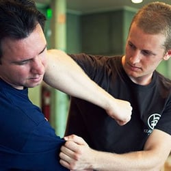 Krav Maga Raleigh - Instructor Ken Richstad and student
