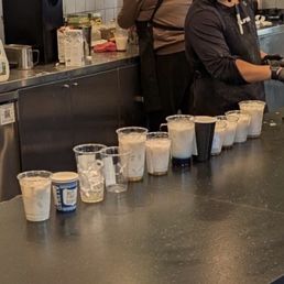 Line of drinks waiting for espresso Line of drinks waiting for espresso