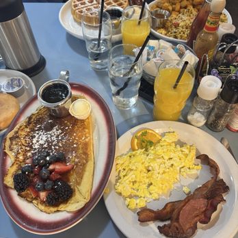 Baby Barnaby's - lemon ricotta pancake, side of bacon and eggs, waffle, migas, and freshly squeezed orange juice. - Breakfast & Brunch Near Me - Houston, Texas Baby Barnaby's - lemon ricotta pancake, side of bacon and eggs, waffle, migas, and freshly squeezed orange juice. - Breakfast & Brunch Near Me - Houston, Texas