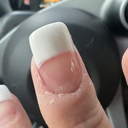 Heads & Nails - White powder over the white tip made it uneven. Absolutely no cuticle removal or lotion.