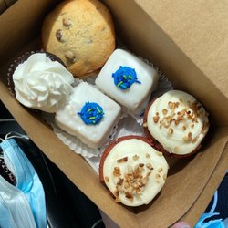 The Cakery - Chocolate cupcake with buttercream, icing cookie sandwich, petit fours and red velvet cupcakes