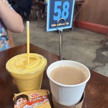 Botiwalla - Hot chai, mango lassi and complementary digestive cookies - Burgers Near Me - Charlotte, North Carolina Botiwalla - Hot chai, mango lassi and complementary digestive cookies - Burgers Near Me - Charlotte, North Carolina