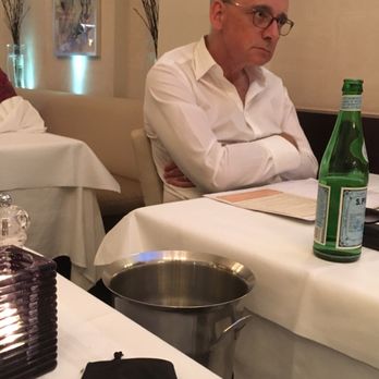 Ristorante Roma - No air conditioning. I asked this couple if I could put my foot in their empty ice bucket to cool off. They said "non". - Italian Near Me - Trier, RP Ristorante Roma - No air conditioning. I asked this couple if I could put my foot in their empty ice bucket to cool off. They said "non". - Italian Near Me - Trier, RP