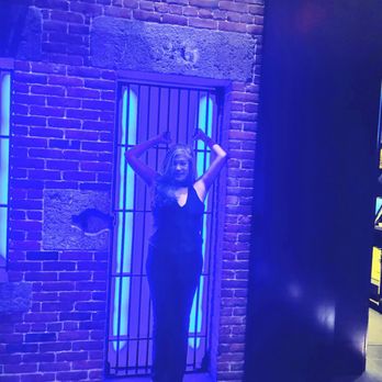 Liberty Bar - a woman standing in front of a door - Bars Near Me - Boston, Massachusetts Liberty Bar - a woman standing in front of a door - Bars Near Me - Boston, Massachusetts
