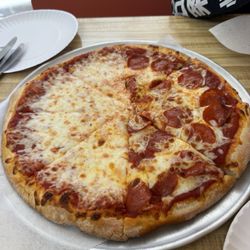 Pizza Palace - Medium cheese pizza, half pepperoni