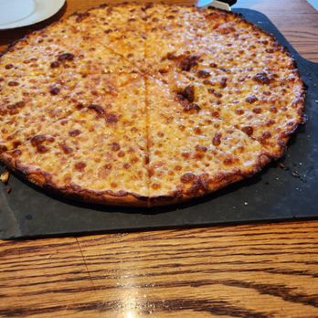 Manville Pizza - The 'Skinny Vinnie'.  A must have.  Tremendous ring of caramelized cheese around the edge - Pizza Near Me - Manville, New Jersey
