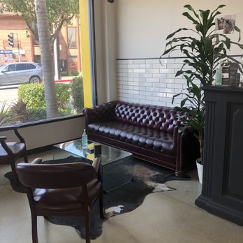 Buzzed Barbers - Waiting area. Sanitizer available and social distancing reminders on the floor. - Barbers Near Me - Glendale, California Buzzed Barbers - Waiting area. Sanitizer available and social distancing reminders on the floor. - Barbers Near Me - Glendale, California