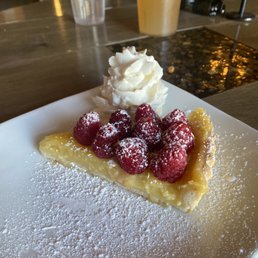 Lemon tart with fresh raspberries!! So good!