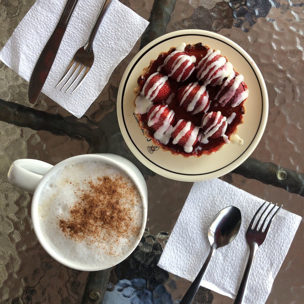 Strawberry tart and cappuccino