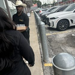 Water given to customers in line!