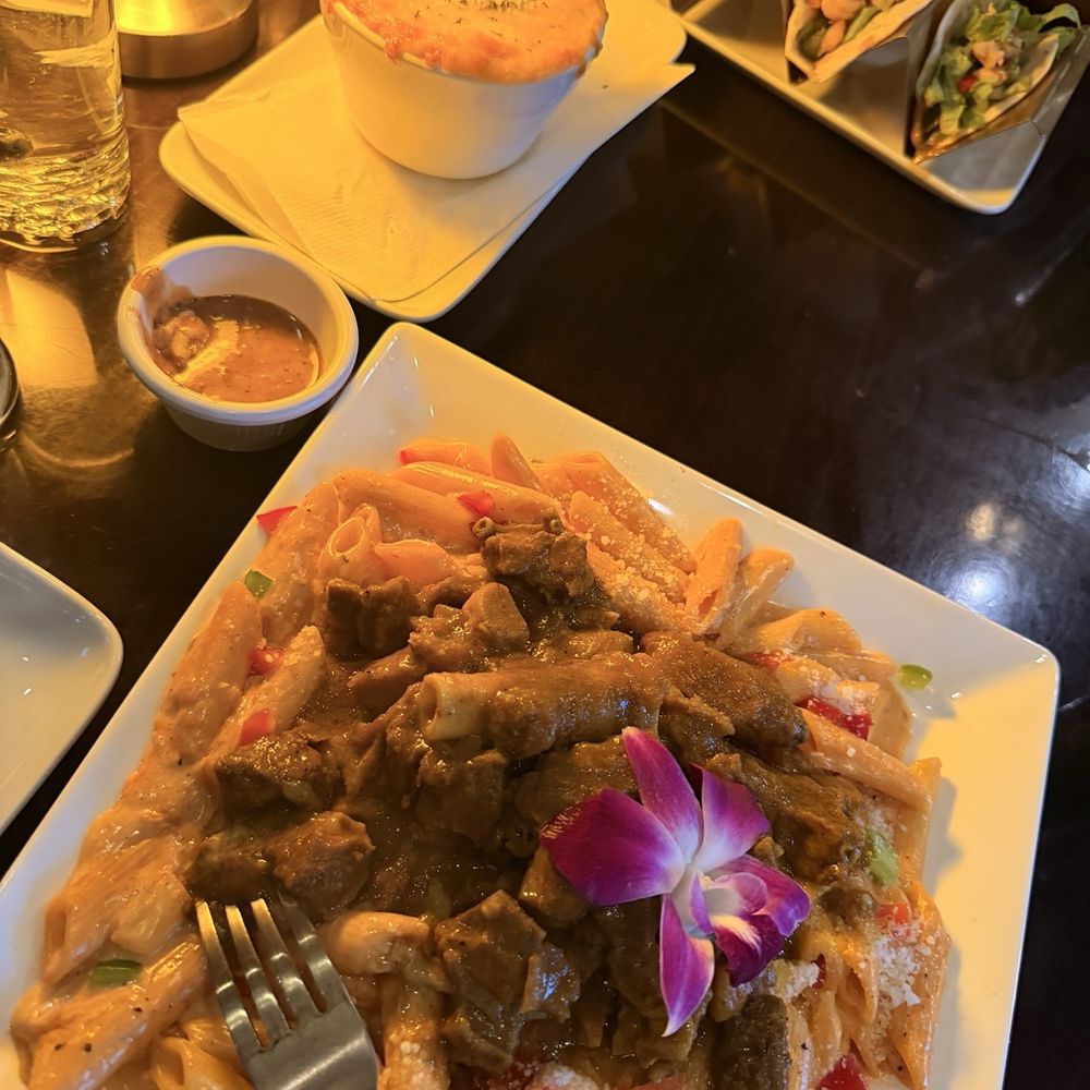 Rasta pasta,curry goat,Mac and cheese,shrimp taco