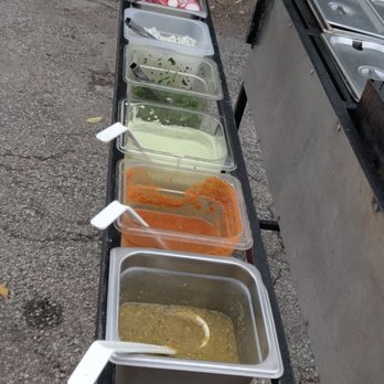 Lorenas Bomb Tacos - a long line of hot and cold food - Street Vendors Near Me