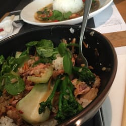 Wagamama - Chicken teriyaki with fried greens & mates plate is green tai chicken curry.
