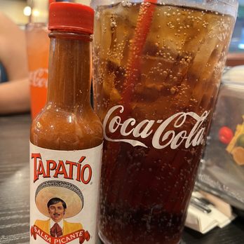 Brandon's Diner - Huge soda next to a regular Tapatio - American Near Me - Upland, California