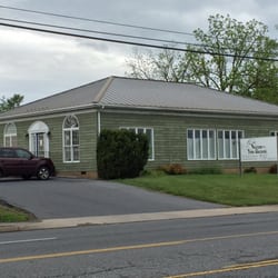 Second Time Around - We're located in this cheery green building at 1153 South High Street.