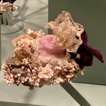 The Museum at FIT - Straw Hat with Off-white Roses (c. 1958, United States) by Salon Moderne - Ravishing: The Rose in Fashion exhibition - The Museum at FIT - Museums Near Me - New York, New York The Museum at FIT - Straw Hat with Off-white Roses (c. 1958, United States) by Salon Moderne - Ravishing: The Rose in Fashion exhibition - The Museum at FIT - Museums Near Me - New York, New York