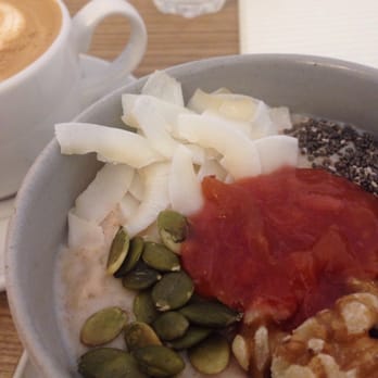 Lundenwic - hearty breakfast porridge -- choose your toppings! I got coconut, pumpkin seeds, walnuts, chia (?) seeds, some kind of sour jam - Coffee & Tea Near Me - London, XGL Lundenwic - hearty breakfast porridge -- choose your toppings! I got coconut, pumpkin seeds, walnuts, chia (?) seeds, some kind of sour jam - Coffee & Tea Near Me - London, XGL