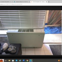 Liberty Inspection Group - it's clear the boxes covering the window, left of the AC unit.
